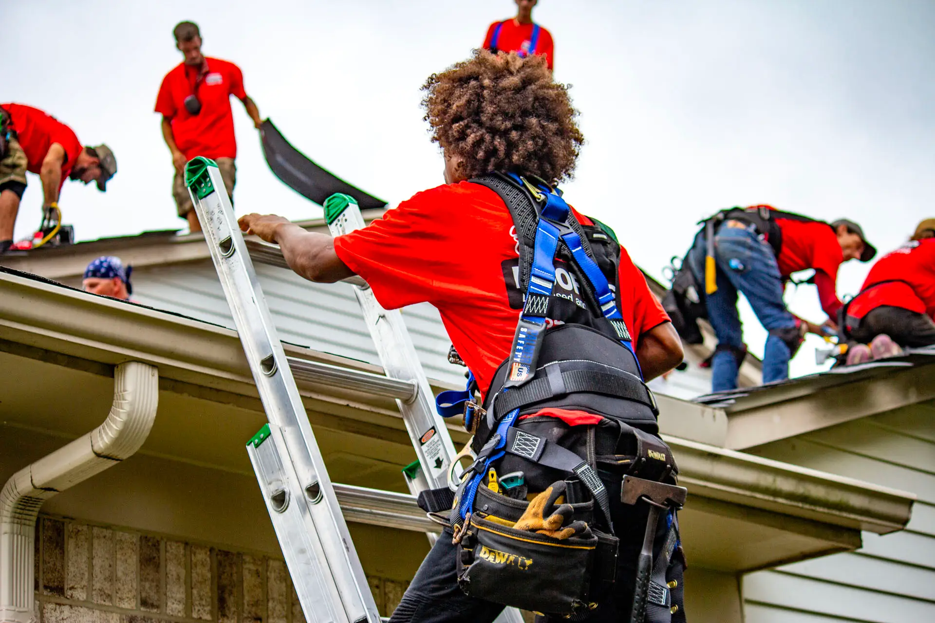 Billy's Roofing crew during roof replacement.