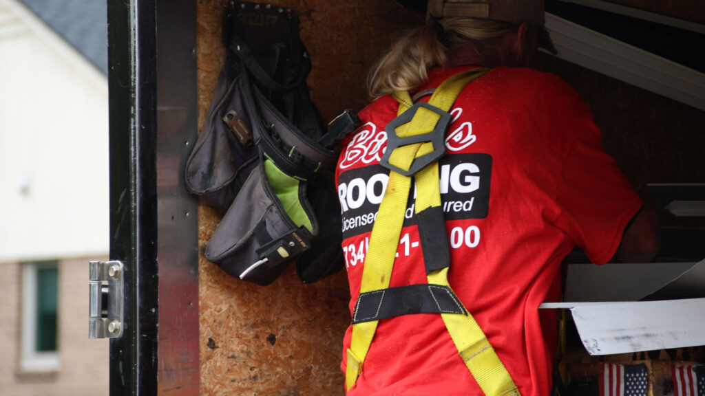 Billy’s Roofing Urges Plymouth Homeowners to Check September Storm Damage Before Winter 3 A Billy’s Roofing roof inspector pulls inspection equipment from a work trailer before starting a full roof inspection.